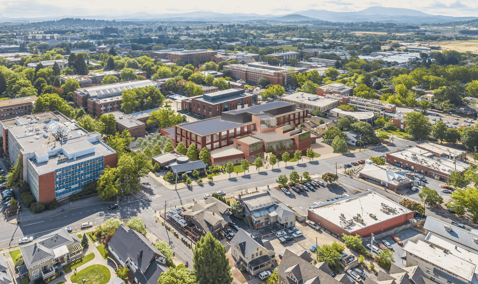 rending of a brick building with large windows surrounded by streets and other buildings